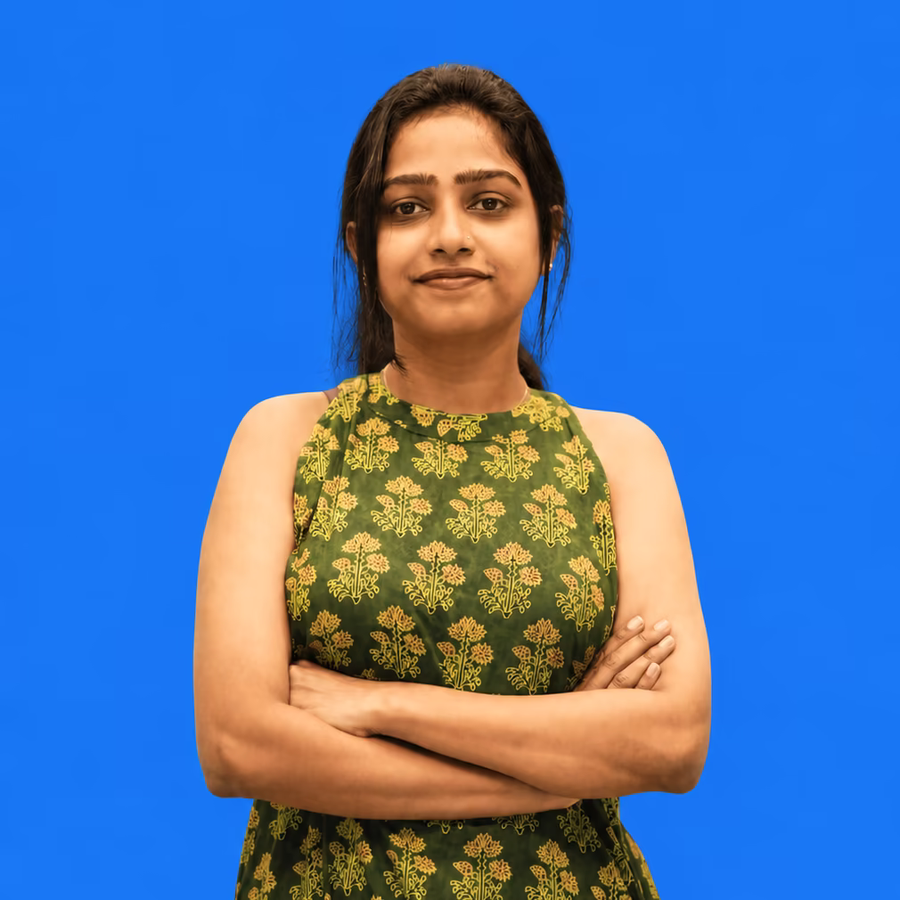Student standing confidently with folded arms
